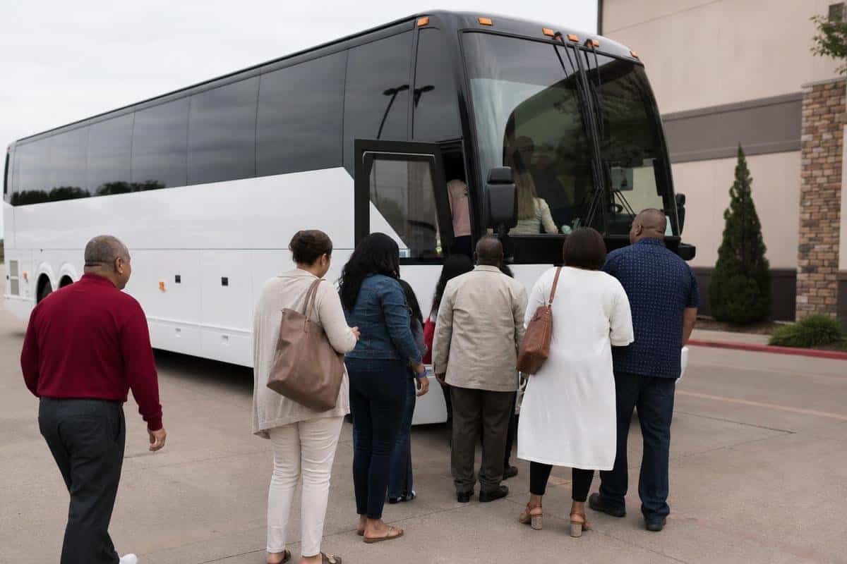 charter bus capacity comparison showing minibus and full-size motorcoach seating options